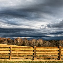 clouds and fence